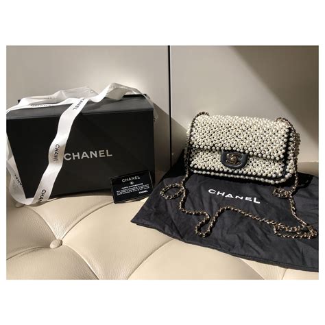 chanel pearl bag 2023|chanel handbags for men.